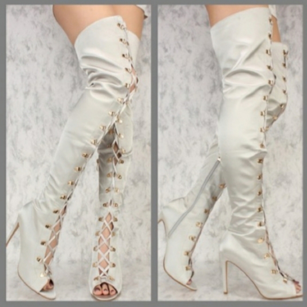 Thigh high lace up boots